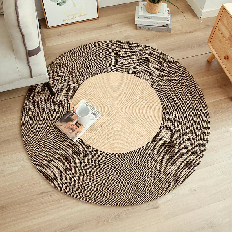 Tapis rond tressé à franges aspect jute