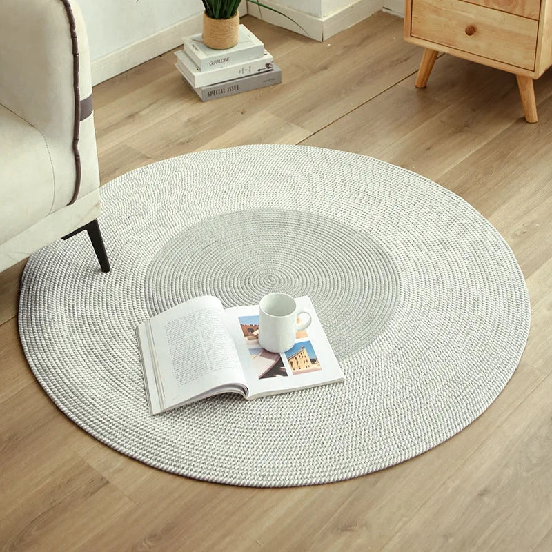 Tapis rond tressé à franges aspect jute